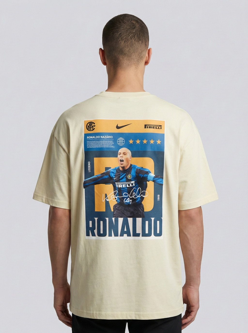 Person wearing a beige t-shirt with a graphic of a football player and 'Ronaldo' text on the back.